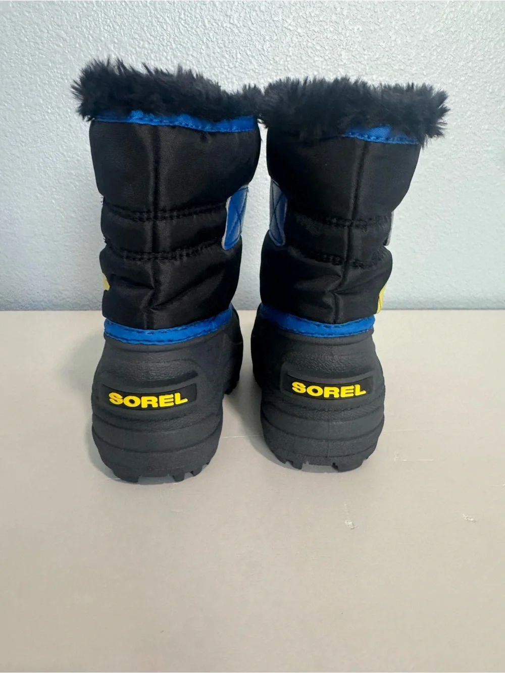 NWOT Sorel Kids Black and Blue Winter Boots with Yellow Polar Bear 7T